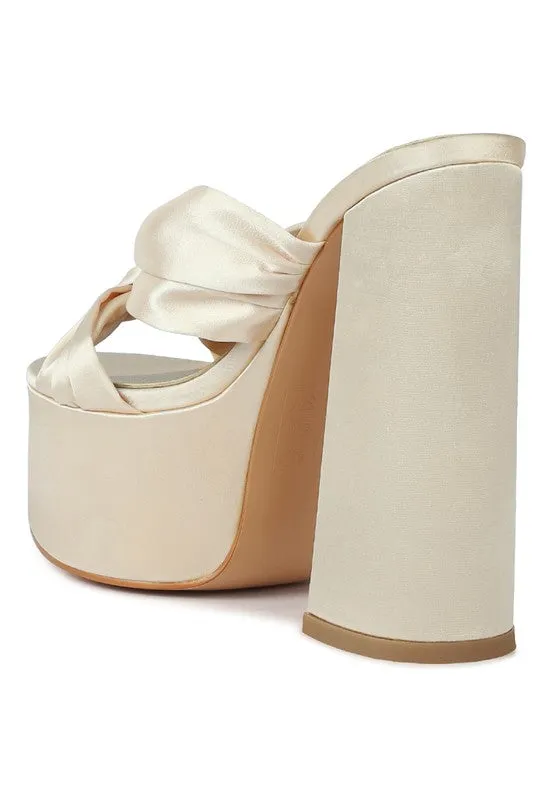 STROBING KNOTTED CHUNKY PLATFORM HEELS